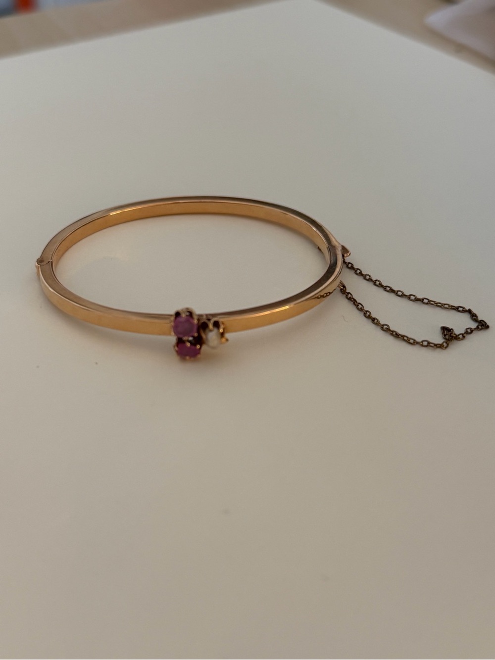 Gold-Tone Women’s Bangle Bracelet with Pink Stone Accent